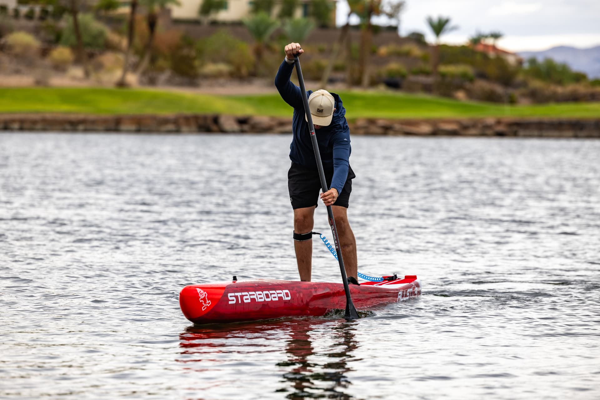 Paddler on a red Starboard board at Lake Las Vegas