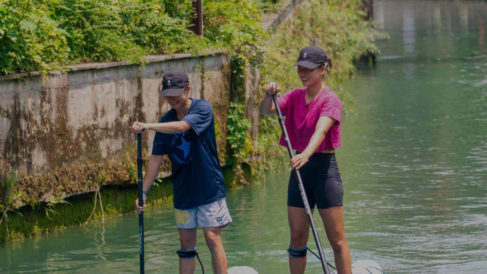 Two paddlers touring on Starboard inflatable SUPs